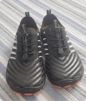 Grounded Footwear black barefoot shoes owned by a customer